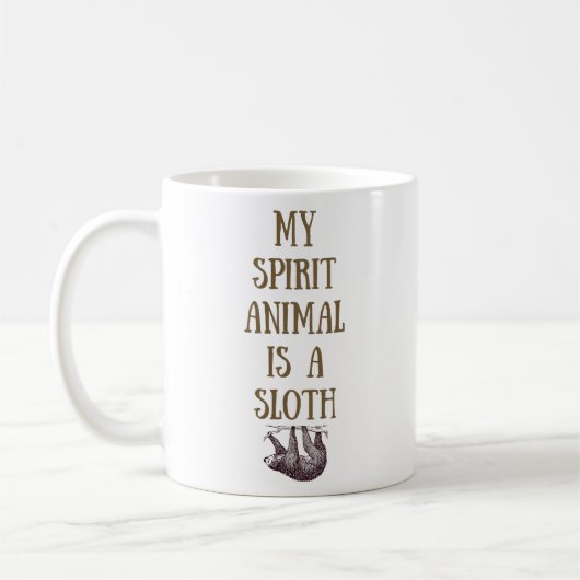 私の精神動物は怠惰のマグです コーヒーマグカップ (左)