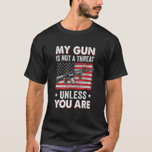 私の銃は、あなたがアメリカの旗でなければ脅威ではない Tシャツ