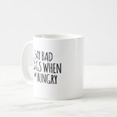 私はお腹が空いたら悪いことを言う コーヒーマグカップ (正面左)