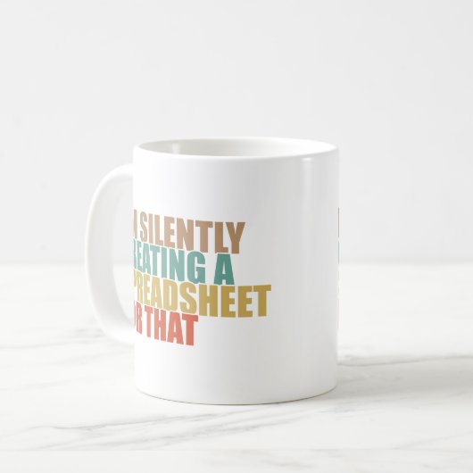 私はそれのためのスプレッドシートを黙って作成している コーヒーマグカップ (正面左)