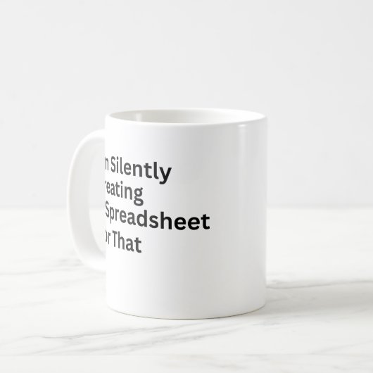 私はそれのためのスプレッドシートを黙って作成している コーヒーマグカップ (正面左)