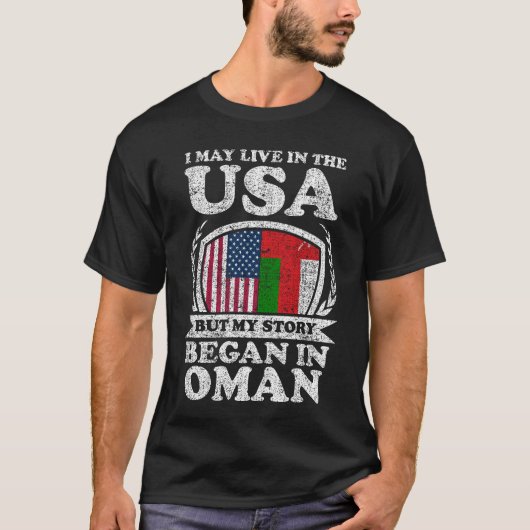 私はアメリカに住むかもしれないが、物語はオマーンで始まった Tシャツ (正面)