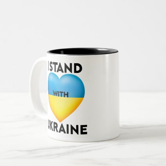 私はウクライナと共に立ち、我々はウクライナを支持する ツートーンマグカップ (正面左)