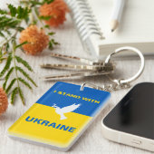 私はウクライナ国旗のドーブ平和に立つ キーホルダー (正面右)