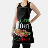 私はサンタのクリスマスのクッキーとミルクを出した エプロン (インサイチュ)