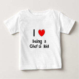 私はシェフの子供のTシャツであることを愛します ベビーTシャツ