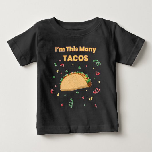 私はタコスの子供の最初の誕生日ベビー ベビーTシャツ (正面)