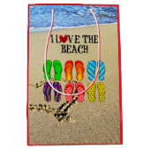 私はビーチ、砂のビーチサンダルが大好き ミディアムペーパーバッグ (正面)