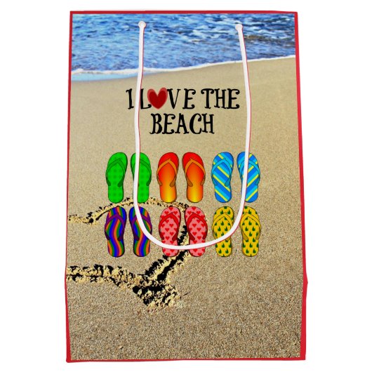 私はビーチ、砂のビーチサンダルが大好き ミディアムペーパーバッグ (裏面)