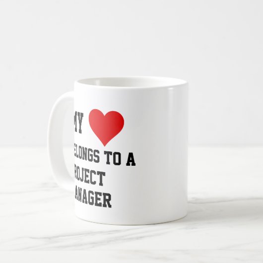 私はプロジェクトマネージャのマグカップに所属している コーヒーマグカップ (正面左)