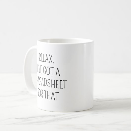 私はリラックスその同僚の得スプレッドシートを持っている コーヒーマグカップ (正面左)