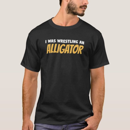 私はレスリングのワニ脚の切断アンプテだった Tシャツ (正面)
