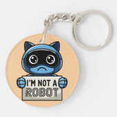 私はロボット猫キーチェーンじゃない キーホルダー (裏面)