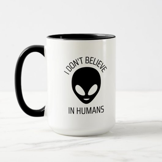 私は人間信じのコーヒマグではない マグカップ (左)