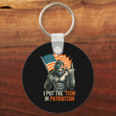 私は愛国主義のビッグフット米国の国旗Reに「主義」を置いた キーホルダー (正面)