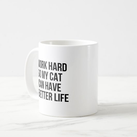 私は懸命を働かせます従って私の猫はよりよい生命を過すことができます コーヒーマグカップ (正面左)