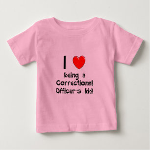私は教化の役人の子供のTシャツであることを愛します ベビーTシャツ