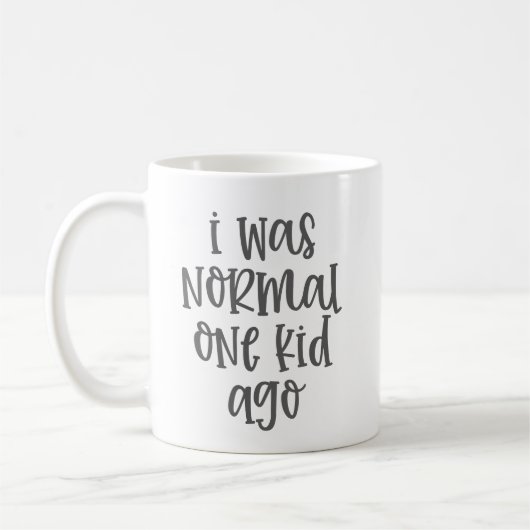 私は普通の一人の子供だった前の子育ておもしろい引用文 コーヒーマグカップ (左)