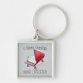 私は本とピアノ、本物のフリーハンドアートが大好き キーホルダー