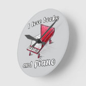 私は本とピアノ、本物のフリーハンドアートが大好き ラウンド壁時計 (傾斜)