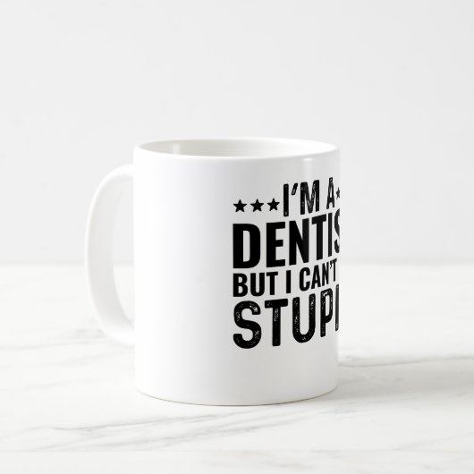 私は歯医者だが馬鹿を直すことはできない コーヒーマグカップ (正面左)