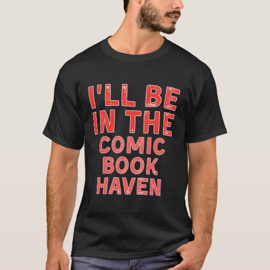 私は漫画ブックヘブンの漫画ブックの散在する Tシャツ (正面)