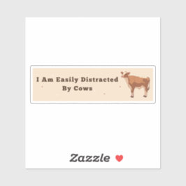 私は牛バンパーのステッカーに気を取られる シール