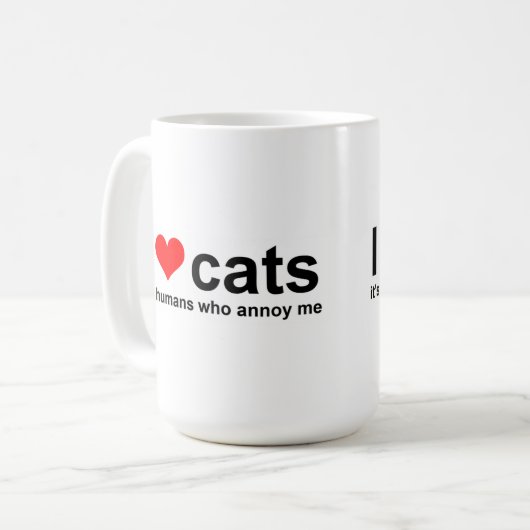 私は猫が大好きで、私を悩ませるのは人間だ コーヒーマグカップ (正面左)