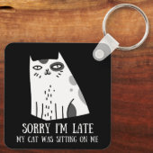 私は猫を座らせるのが遅くなってごめんなさい キーホルダー (裏面)