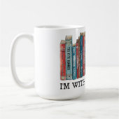 私は禁止された文芸陶芸のマグカップを持っている コーヒーマグカップ (左)