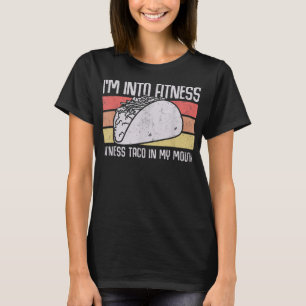 私は私の口の中のフィットネスタコに入っている男性の若い女性 Tシャツ