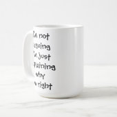 私は自分が正しい理由を説明するだけで自分を議論しているのではない コーヒーマグカップ (正面左)