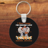 私は衣服オレンジ私は白血病を愛する人のために待っている キーホルダー (正面)