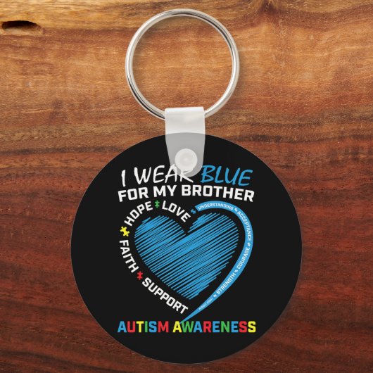 私は衣服ブルー私の兄の自閉症啓発製品 キーホルダー (正面)