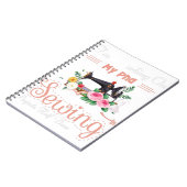 私は裁縫で半分行われた博士課程のプロジェクトに取り組んでいる ノートブック (左側)