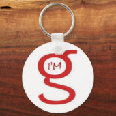 私は赤いロゴのG Keychain キーホルダー (正面)