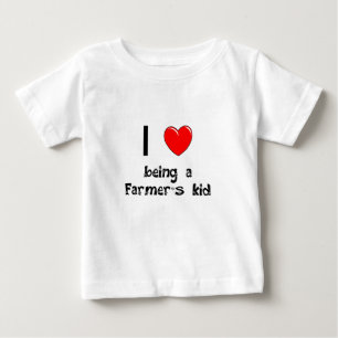 私は農家の子供のTシャツであることを愛します ベビーTシャツ
