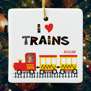 私は電車の中で子どもたちの写真とクリスマスの名前を挙げる セラミックオーナメント