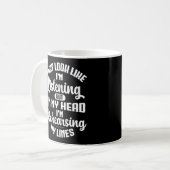 私は頭の中聞にいるようだおもしろい コーヒーマグカップ (正面左)