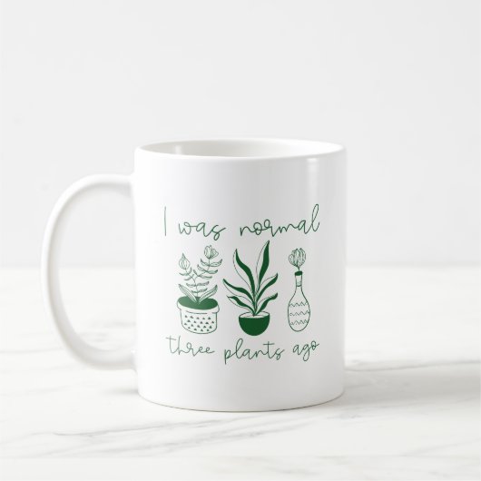 私は3つ前は普通の植物だった コーヒーマグカップ (左)