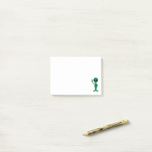 私達は平和小さいグリーンマンのエイリアンのシルエット入って来ます ポストイット (デスク上)