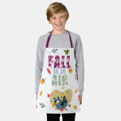 秋がアライグマをスイングして空中にある エプロン (着用した状態)