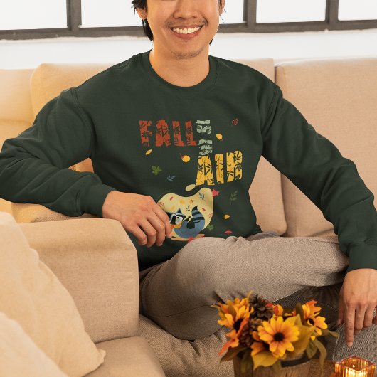秋がアライグマをスイングして空中にある スウェットシャツ