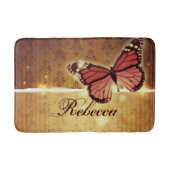 秋のオレンジ色の花が咲き乱れた蝶 バスマット (正面)