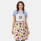 秋のカボチャの果実パターンモノグラム名 エプロン (着用した状態)