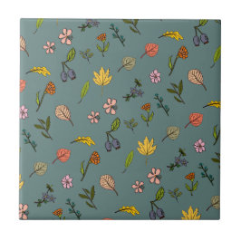 秋のピンク色の黄色い花と葉緑色 タイル