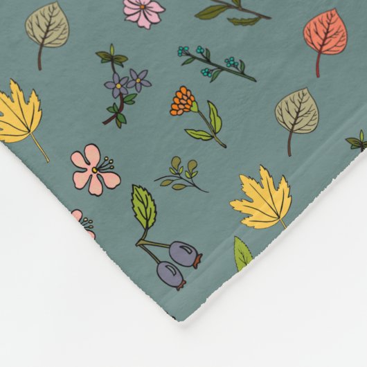 秋のピンク色の黄色い花と葉緑色 フリースブランケット (角)