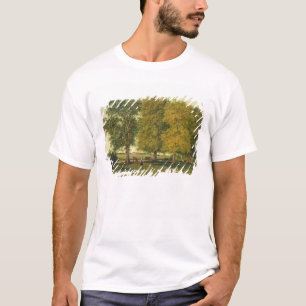 秋の木の下の牛を持つ牧夫 Tシャツ