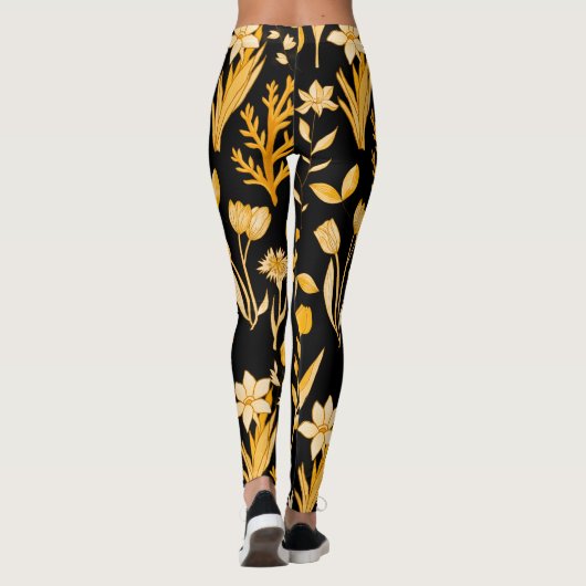 秋の黄金色の花の模様。黒BG レギンス (裏面)