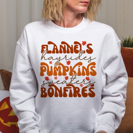 秋をテーマにしたフランネル、カボチャ、焚き火 スウェットシャツ